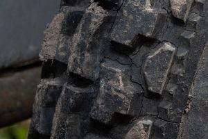 old tires that are cracked and worn with dry rot